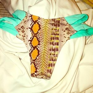 New MONTCE  swim bottoms small